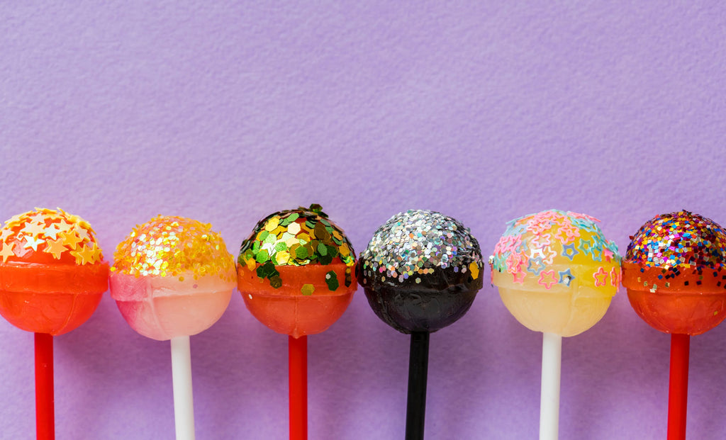 Glittery, sugary lollipops in different colors