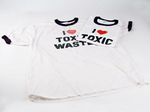 two i love toxic waste shirts, one is faded and one is new