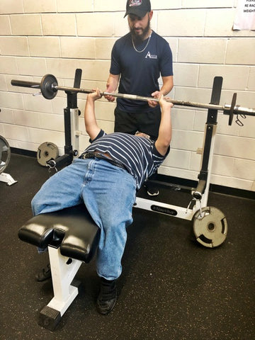 adaptive athlete bench pressing