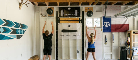couple in home gym