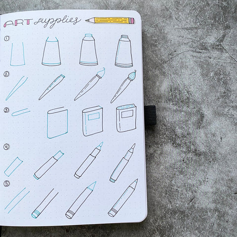 Bullet Journal with Art Supply Doodles