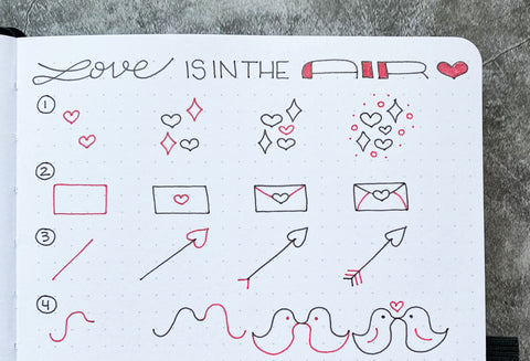Bullet Journal doodles with hearts, envelopes, arrows, and birds