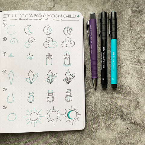 Bullet Journal with moon child doodles and Pitt Artist Pens
