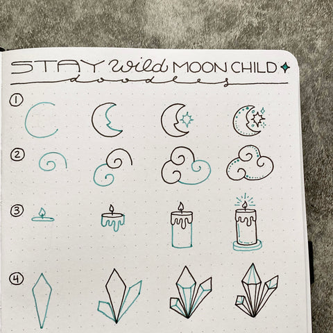 Bullet Journal with moon child doodles 