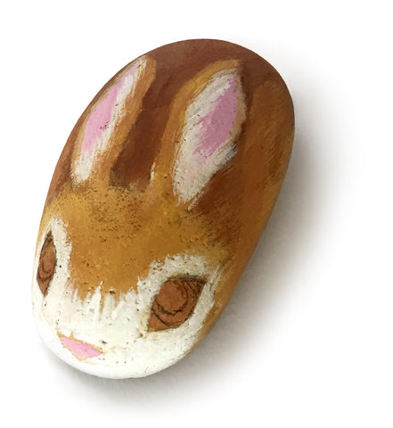 Rock with bunny painted on it