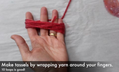 Yarn wrapped around hand