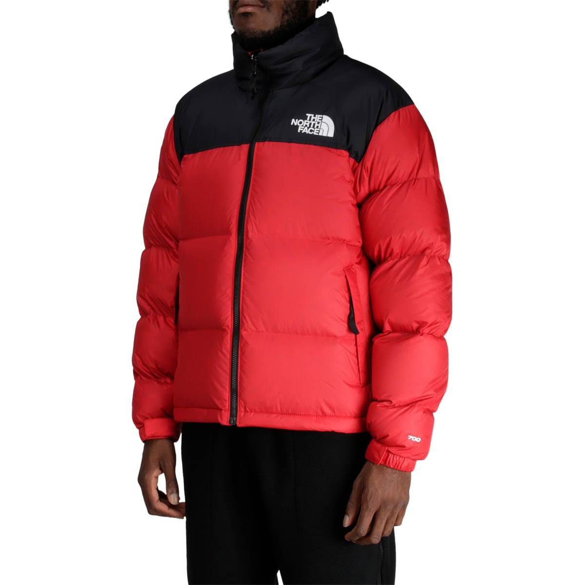 red and black north face nuptse jacket