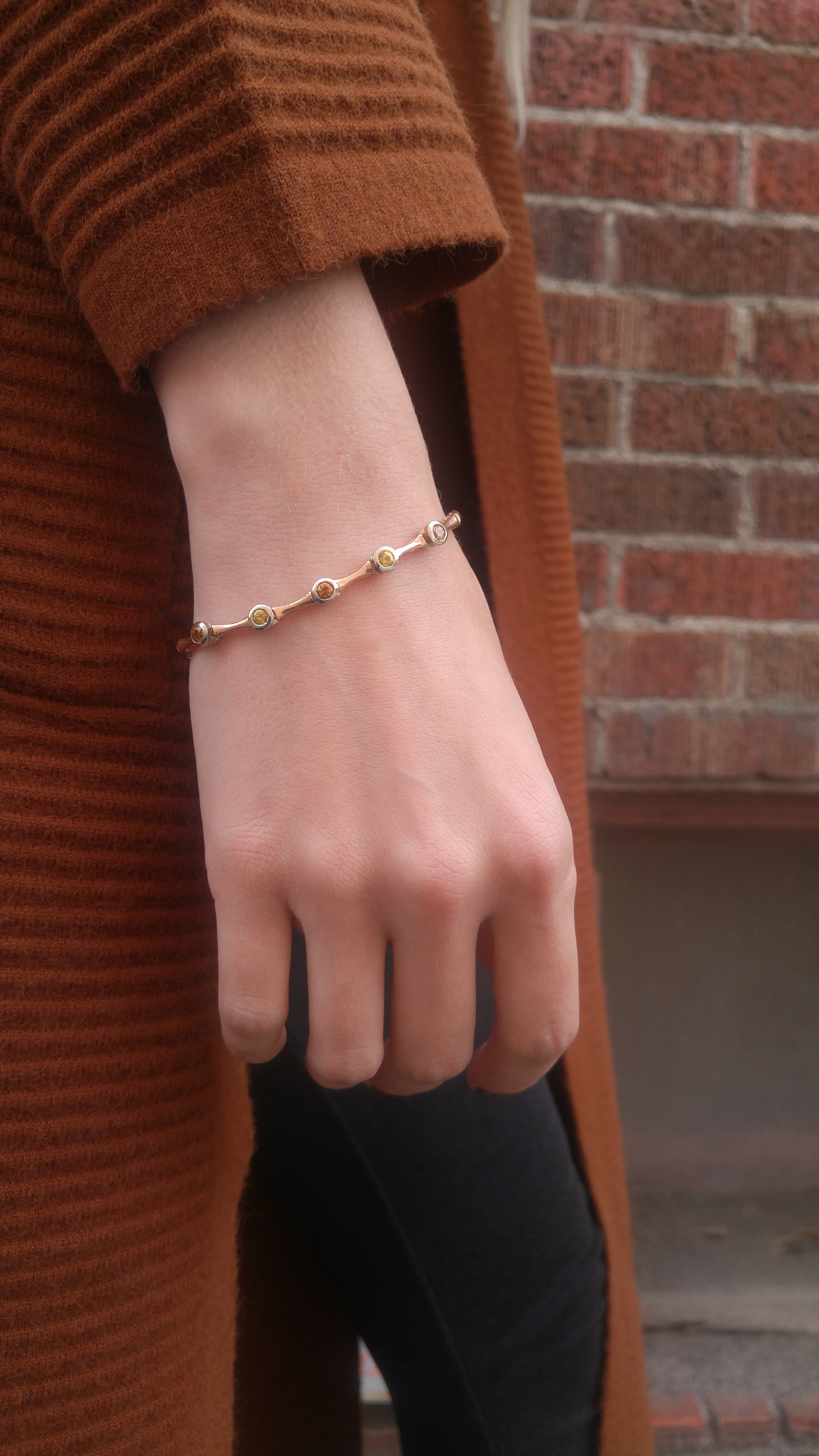 Rose gold bracelet with yellow and orange sapphires