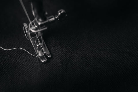 Sewing of black garment on Rhetorik Clothing blog