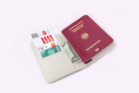 Why You Should Have A Passport Holder Or Passport Case? Pros and Cons