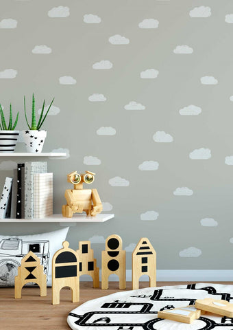 Childs bedroom with scandi style grey wallpaper with small white clouds. 