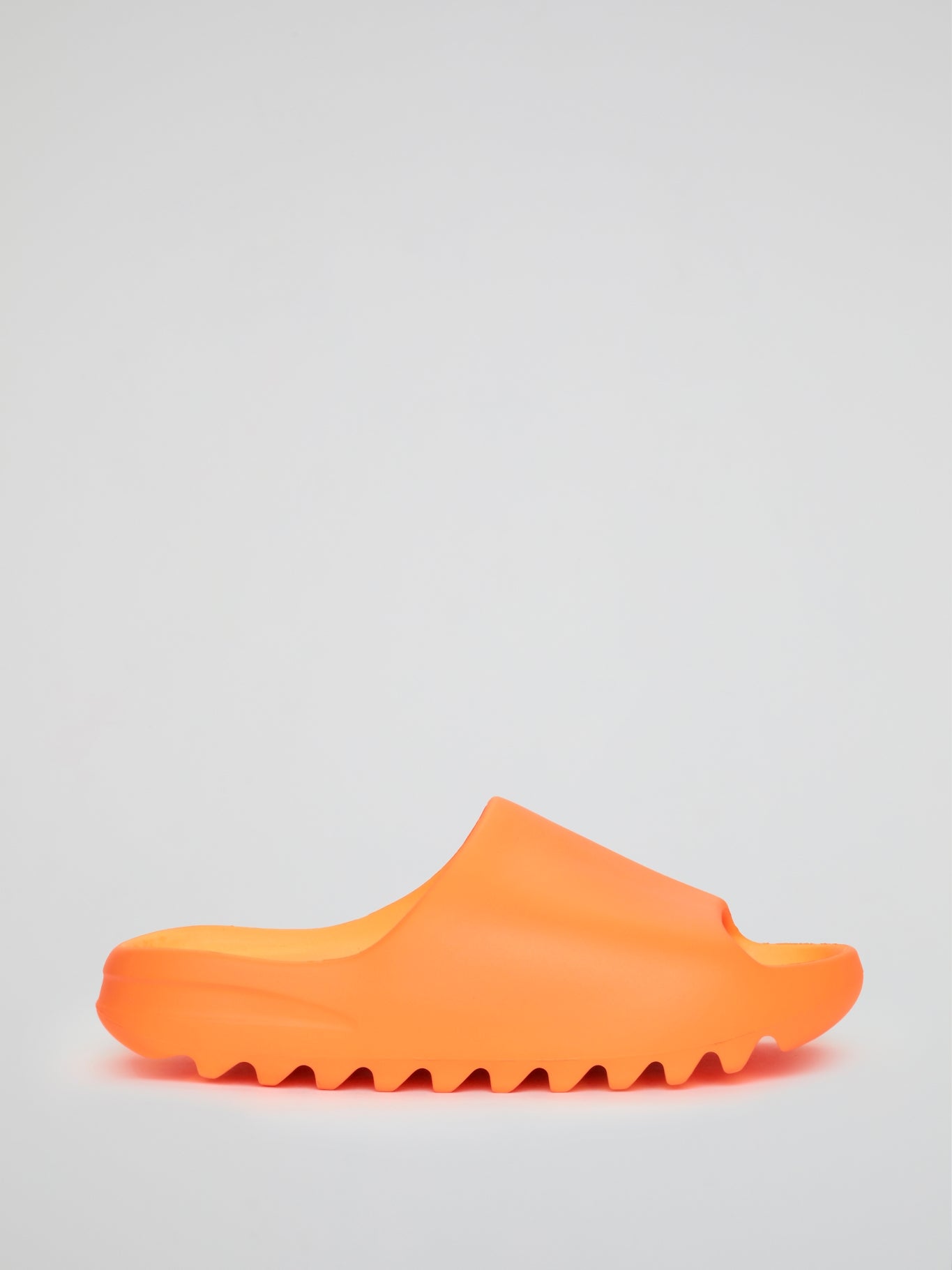 orange yeezys slides