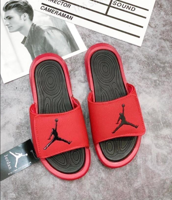 red and black jordan flip flops