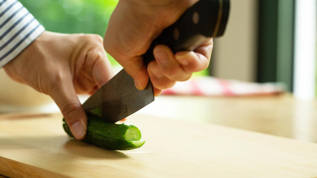 cutting cucumbers for pico de gallo