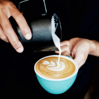 Close up of latte art in blue cup