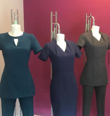 A range of three Florence Roby uniforms showing different sizes