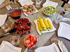 A dinner of ribs, corn and salad