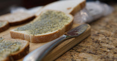 Pesto spread on a piece of bread