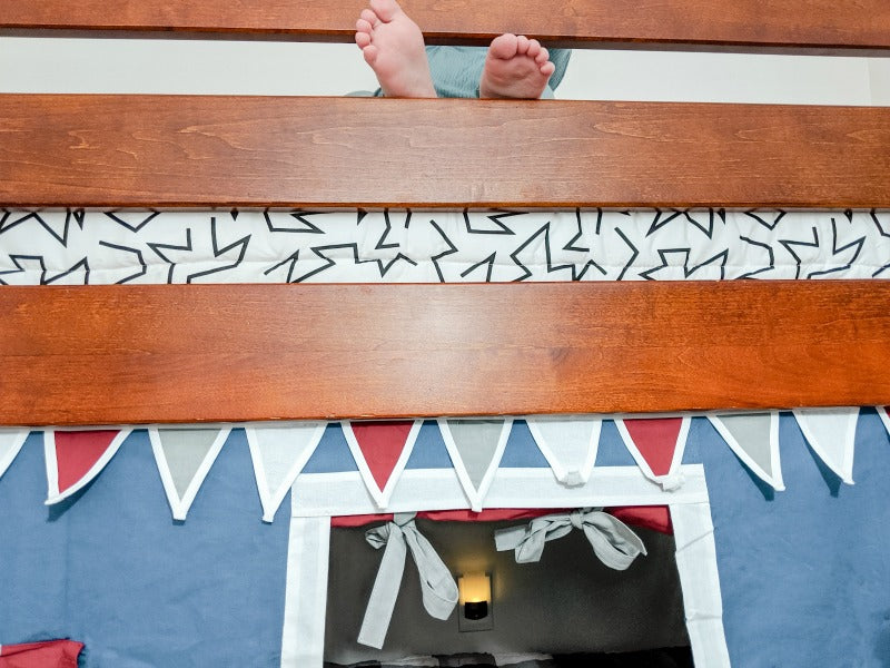 low loft bed with curtains