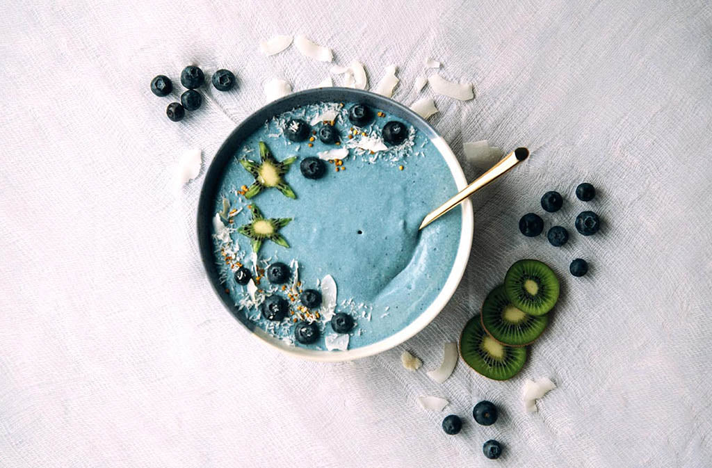 keto mermaid smoothie bowl with marine collagen on a white background