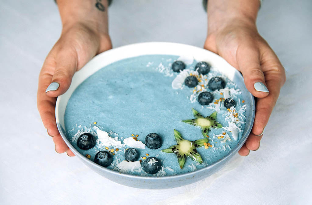 keto mermaid smoothie bowl with marine collagen on a white background