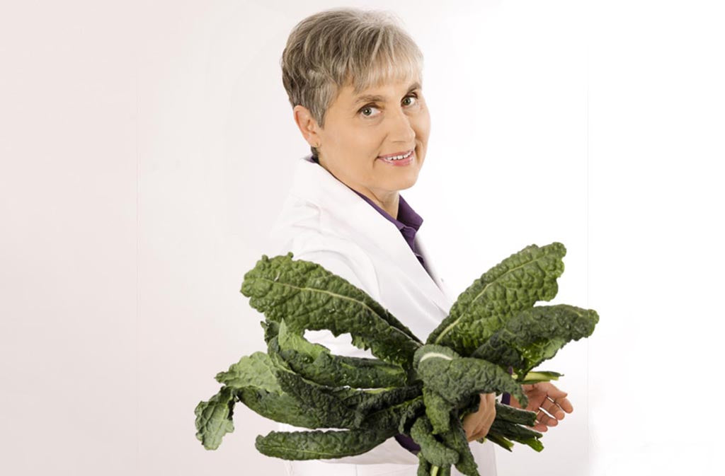 terry wahls holding a bunch of kale