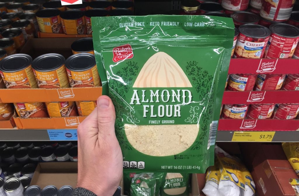 hand holding a package of almond flour