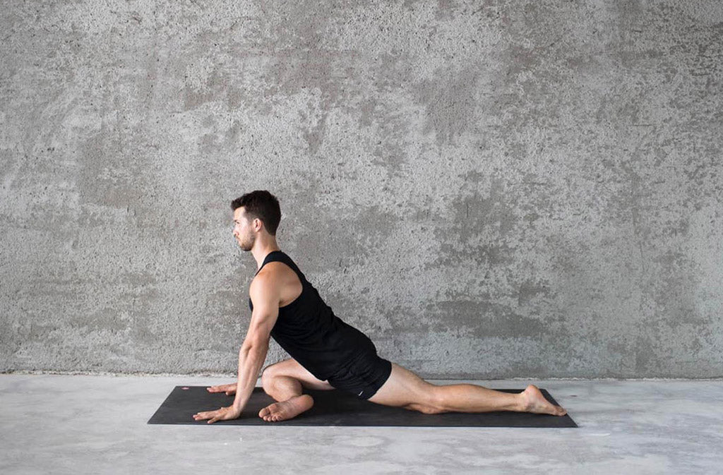 man in yoga pose