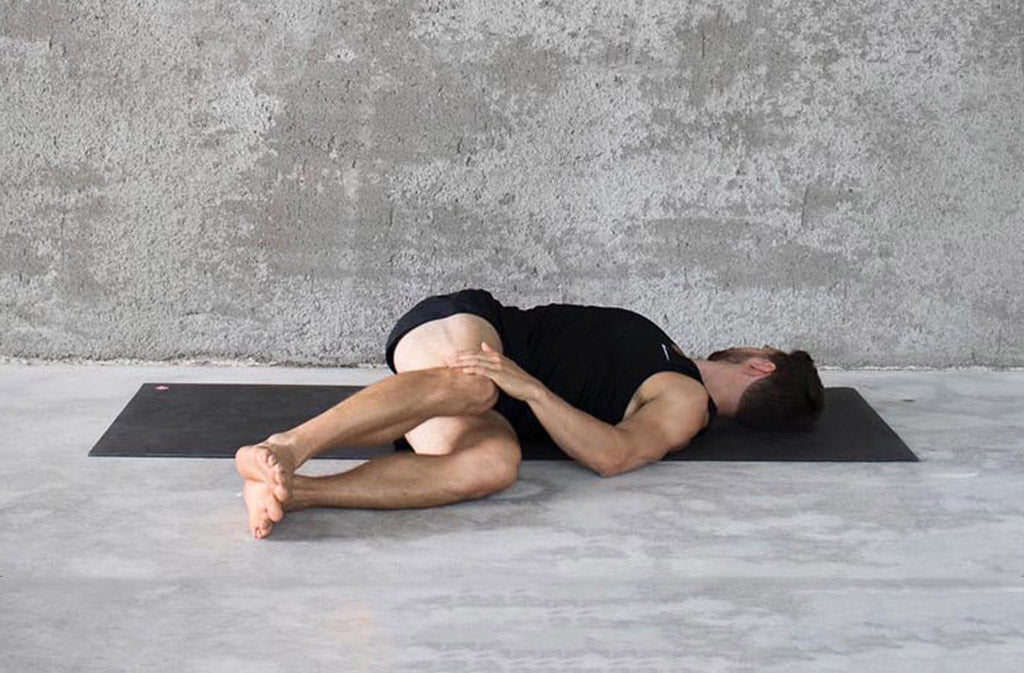 man in yoga pose