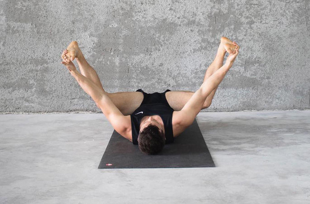 man in yoga pose