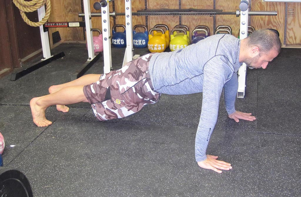 man in plank position
