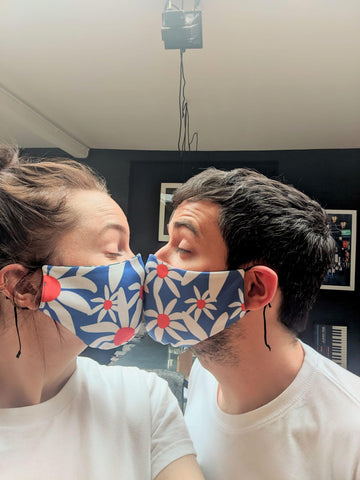 Looking cute in Newt, this pair are stylishly wearing our ethically made Daisy face masks.