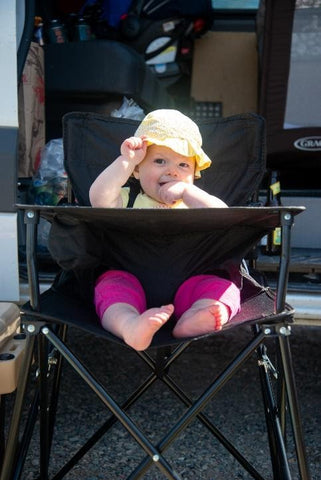 Baby in a camping chair. 