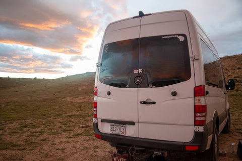 A camping van and sunset.