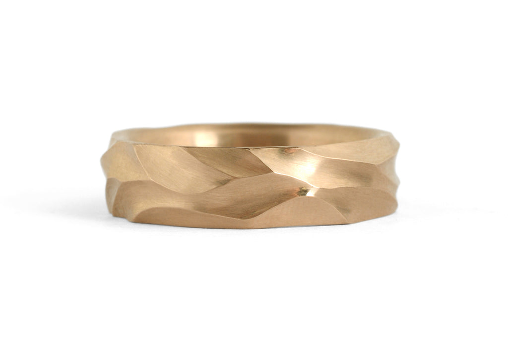 Rose gold carved mens wedding band