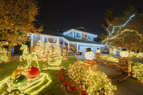Christmas house lights with snowman Christmas songs and carols