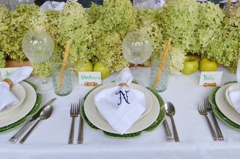 Green and white tablescape with bamboo details