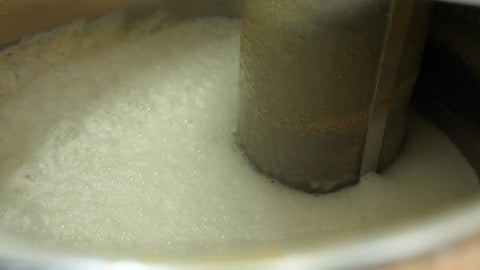 aerated wort with a bubbly head