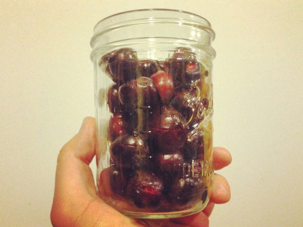 Pack the jar full of cherries