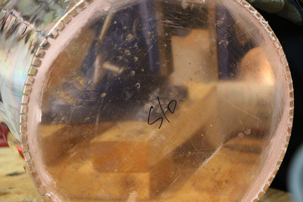 Solder circular bottom inside copper still boiler