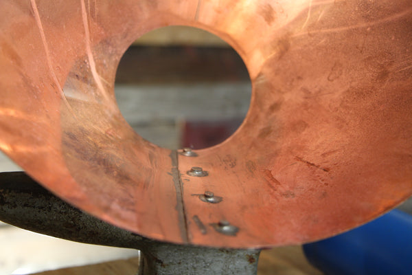Form, rivet, and solder copper vapor cone