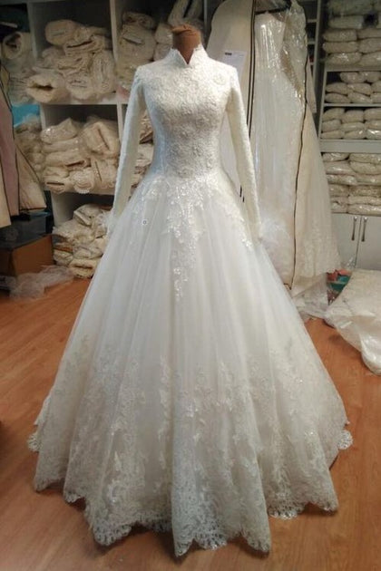 long sleeve lace wedding dress with tulle skirt