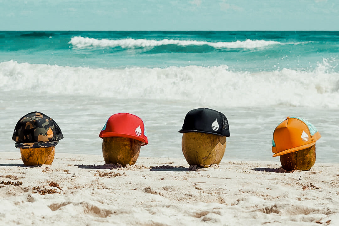 BUOY WEAR floating hats on the beach