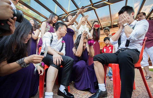 8 Chinese Traditional Door Games to Play at Your Chinese Wedding, Wax Legs