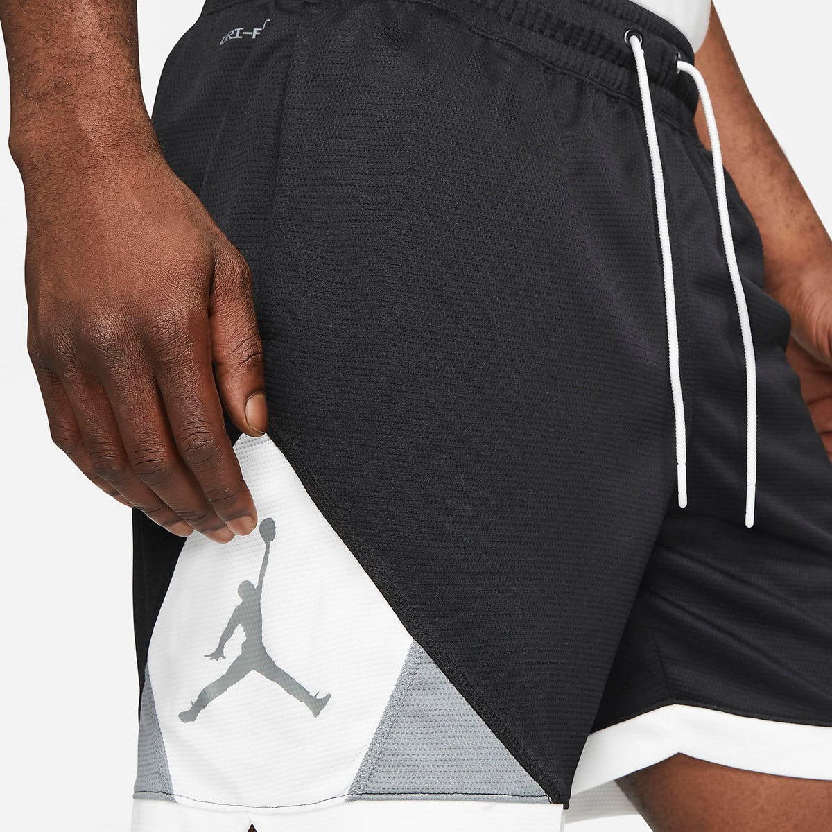 grey and white jordan shorts