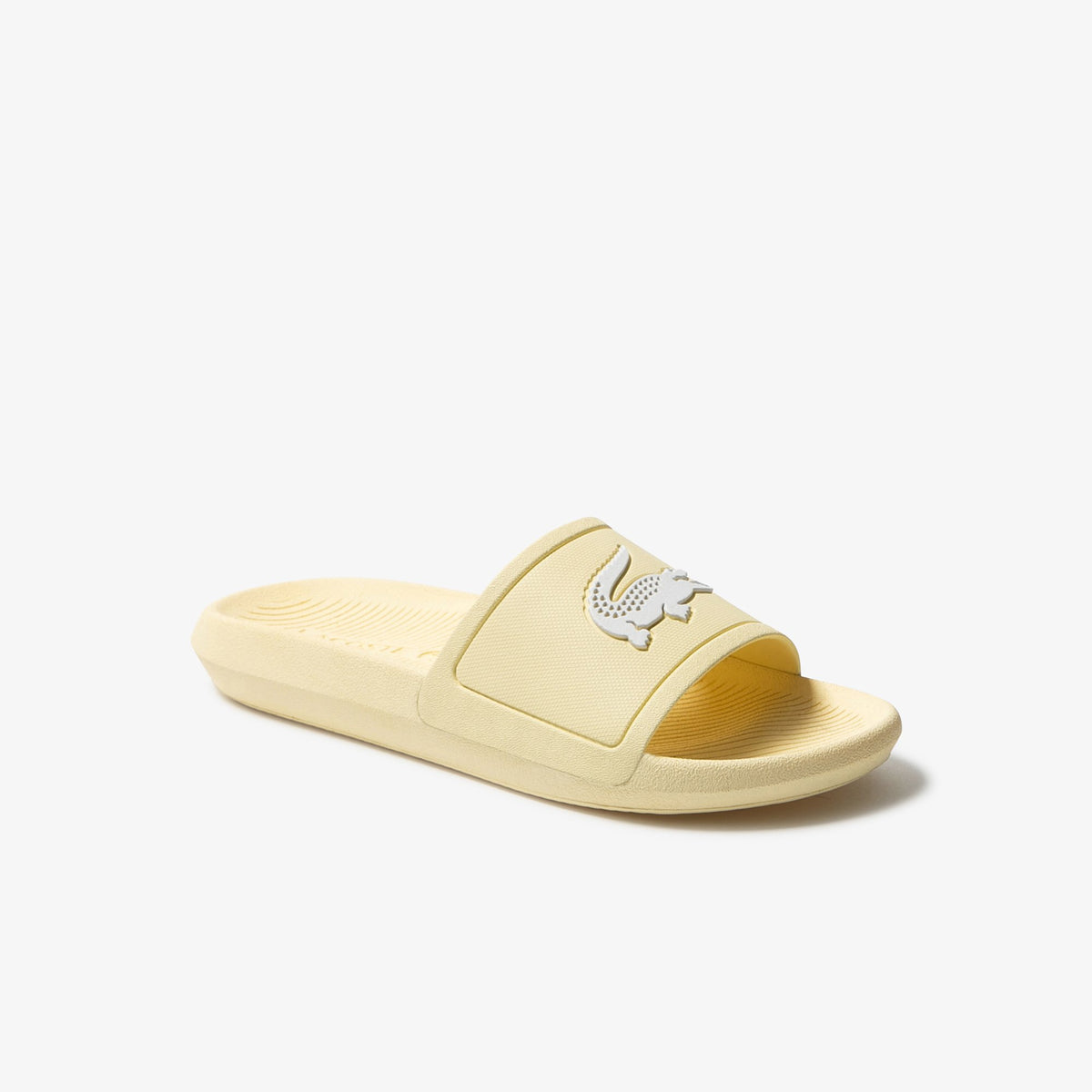 white and gold lacoste slides