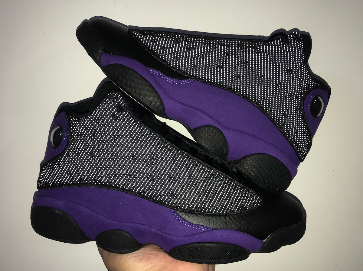 black and purple air jordan 13