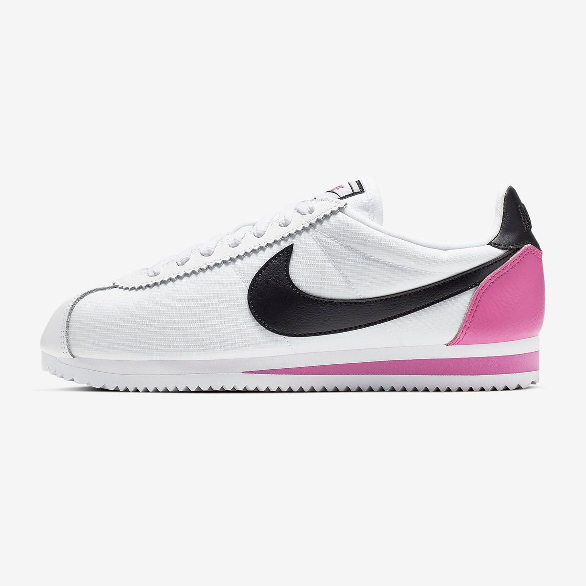 white and pink nike cortez