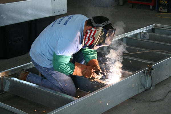 Welding a floating dock frame