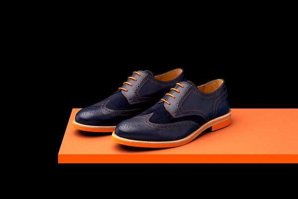 navy blue and orange shoes